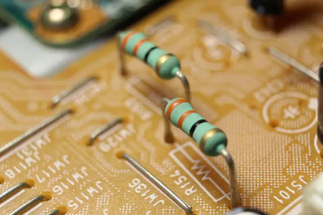 Resistors mounted on a printed circuit board (PCB).