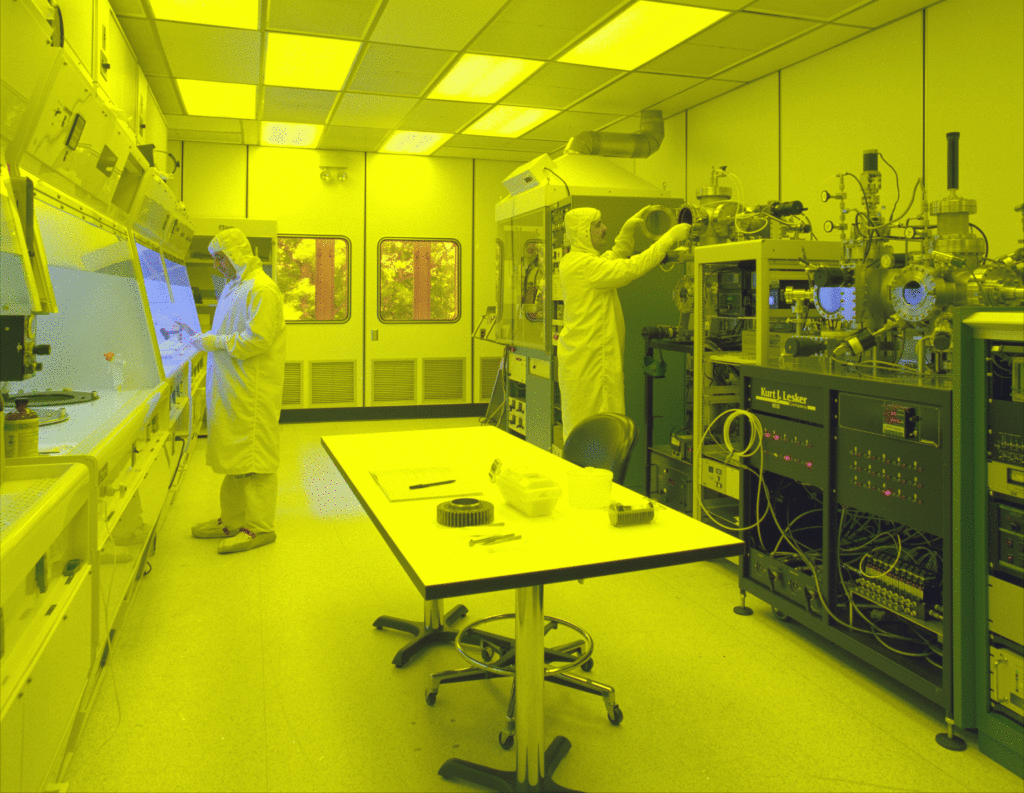 A NASA cleanroom. Advances in fabrication technologies have enabled Moore's Law.